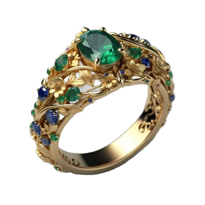 Gold-tone hollow-out carved ring with green and blue zircon stones on a white background