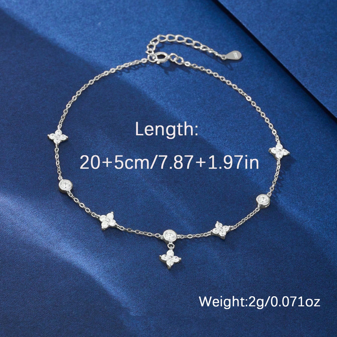 Silver clover and star anklet with length and weight specs, 20cm plus 5cm extender