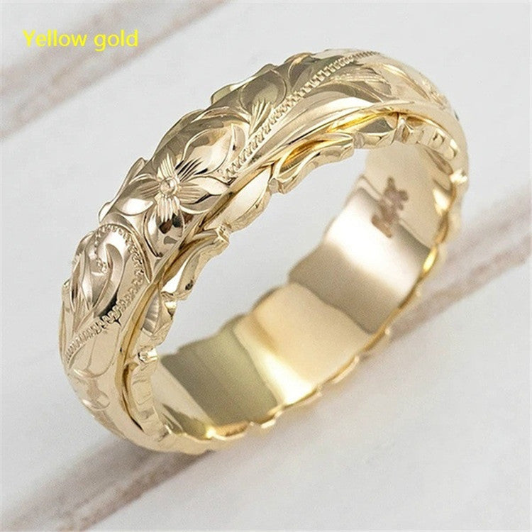 Rose flower carved ring band in yellow gold finish, close-up view