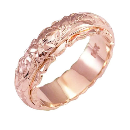 Rose flower carved ring band in rose gold finish, product photo on white background