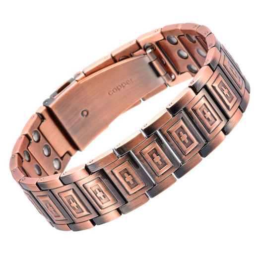 Clasp closure on the ancient red copper magnetic bracelet with copper stamp detail