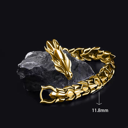 Gold-tone dragon chain bracelet for men on dark stone background, 11.8mm wide links