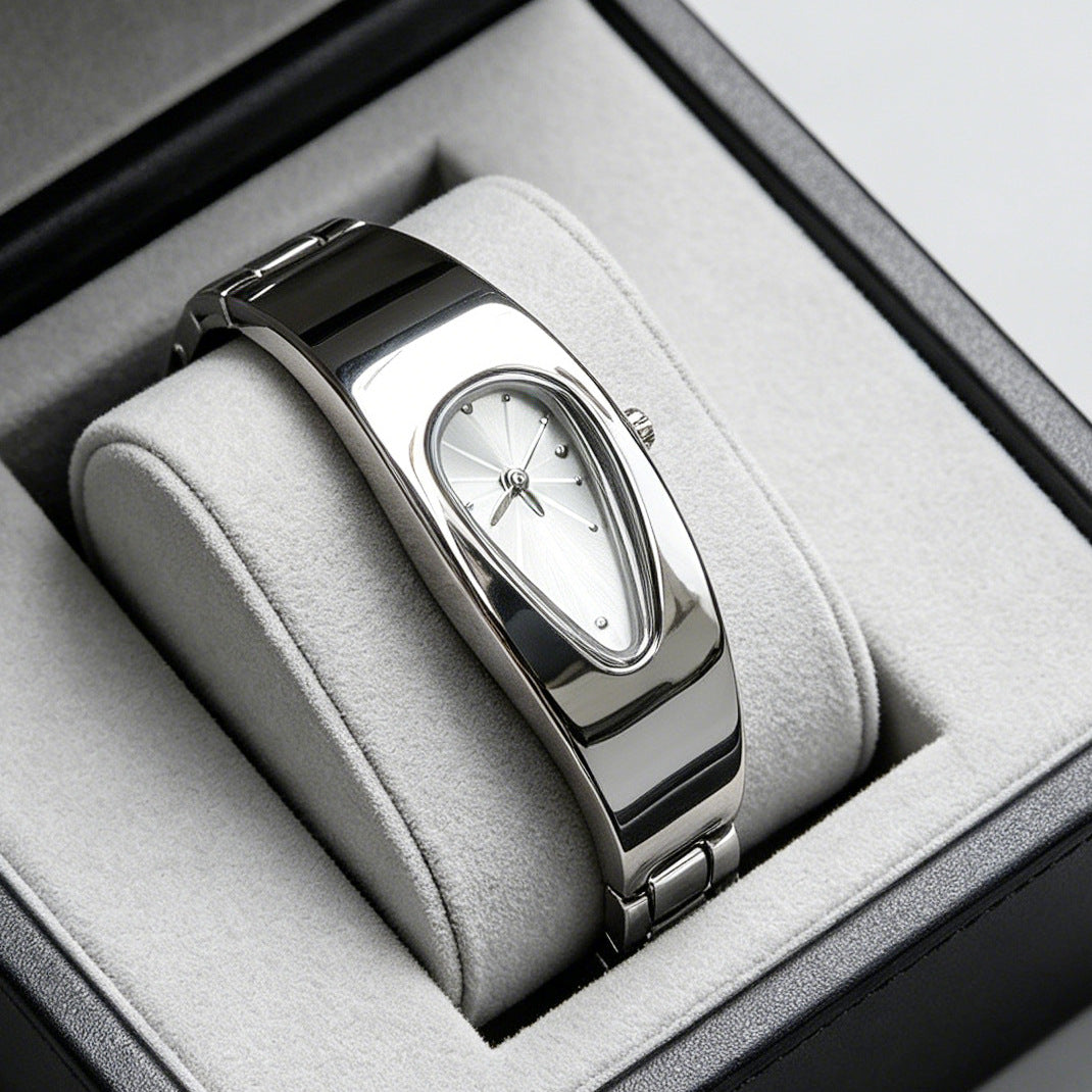 Silver and white water drop watch on jewelry display stand, side angle