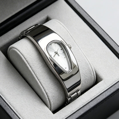 Silver and white water drop watch on jewelry display stand, side angle