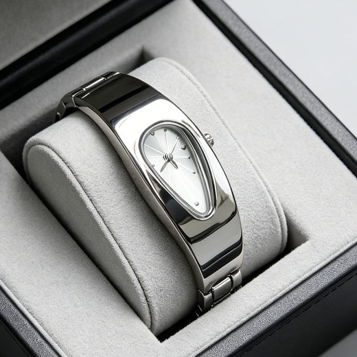 Silver and white water drop watch on jewelry display stand, side angle