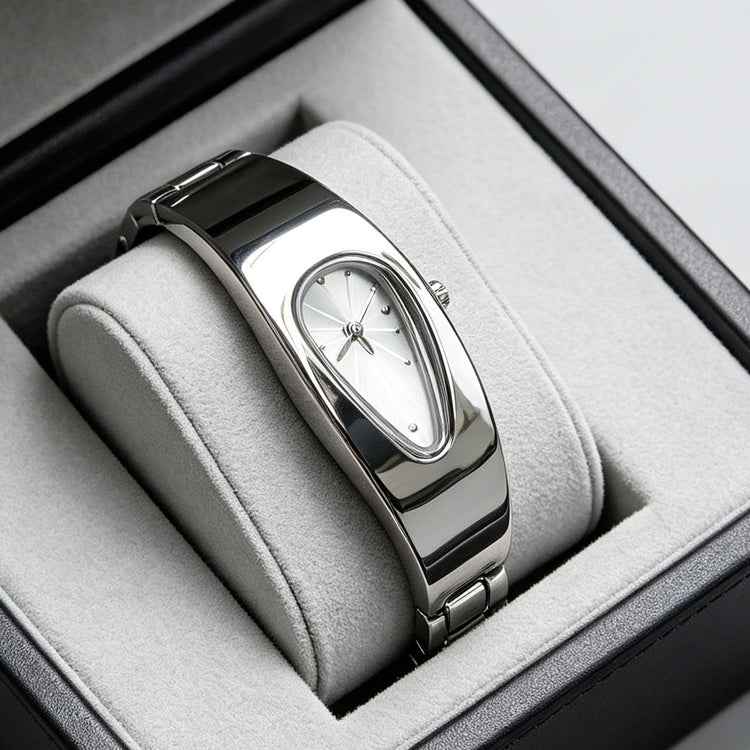 Silver and white water drop watch on jewelry display stand, side angle