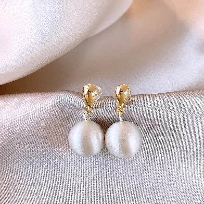 Frosted brushed ball stud earrings, side view