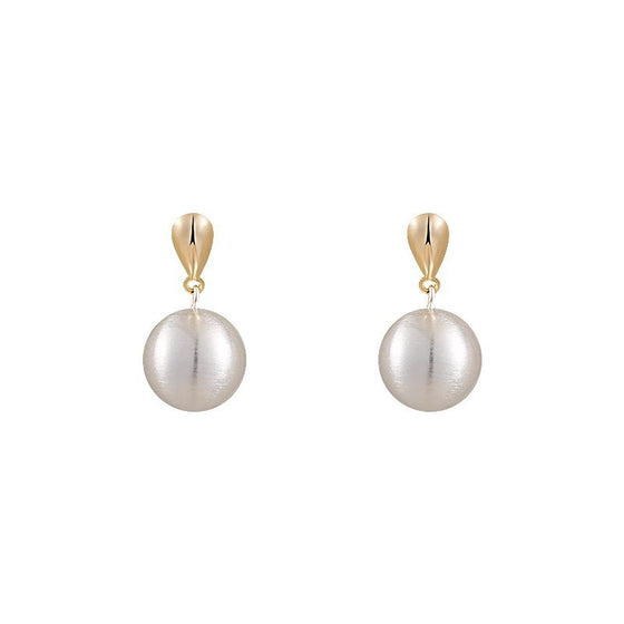 Frosted brushed ball stud earrings, detail of the gold-tone post