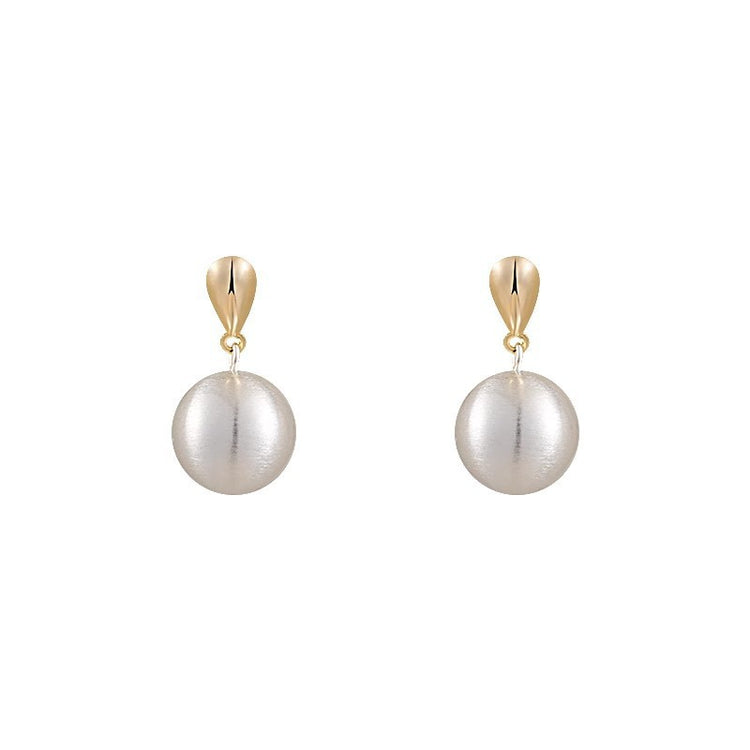 Frosted brushed ball stud earrings, detail of the gold-tone post