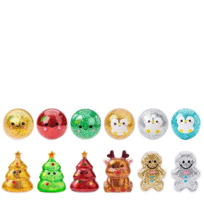 Row of glittery Christmas squishy toys including bells, trees, reindeer and gingerbread men