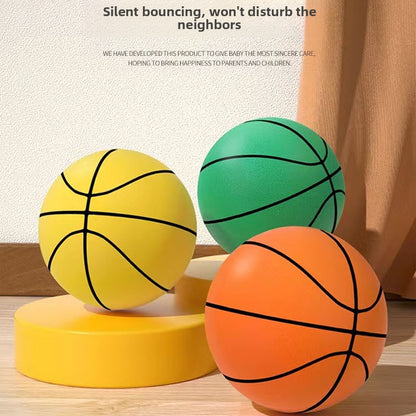 Yellow, green, and orange silent foam basketballs bouncing quietly indoors