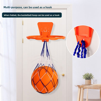 Foldable orange basketball hoop mounted on a door with nano adhesive tape, folded flat to double as a hook
