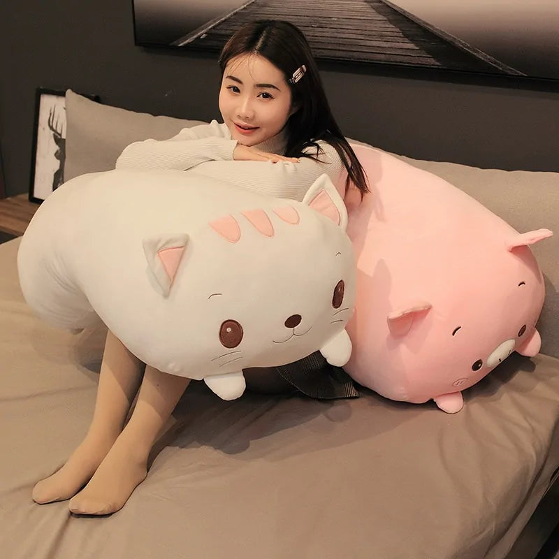 Plush animal shown seated upright displaying its full body