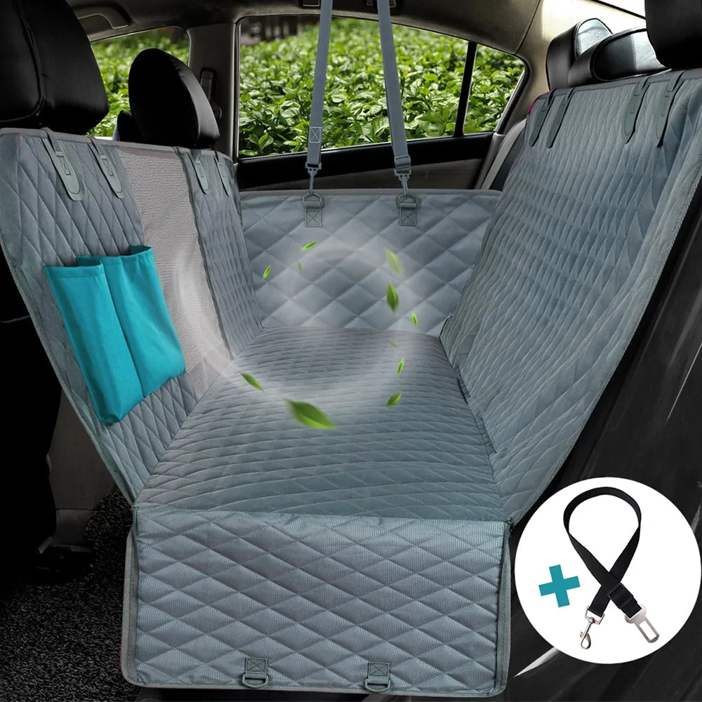 Grey diamond-quilted rear car seat cover with a center mesh window and teal side storage pockets for pet travel